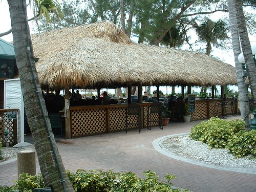 Open-air tropical bar on the beach in Naples, Florida
