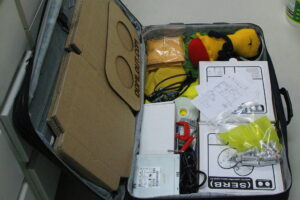 Suitcase packed and ready for a beach vacation