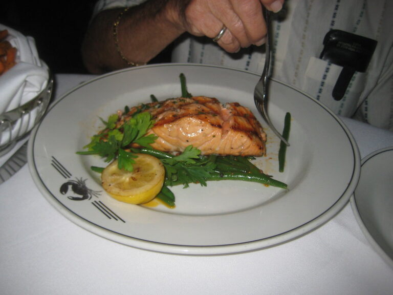 Elegantly plated fresh salmon dish at a fine dining restaurant