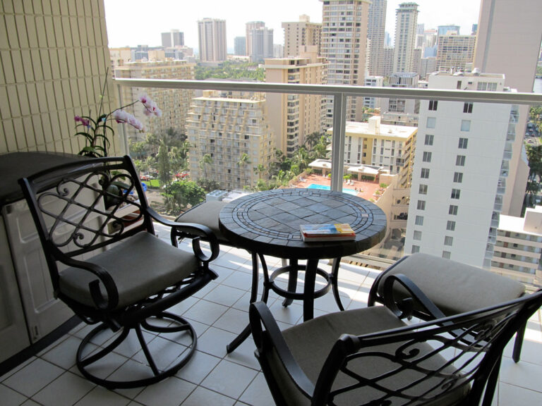 Private condo balcony overlooking a resort setting