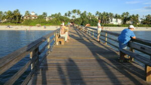 Fishing pier stretching into the Gulf of Mexico at Naples, Florida